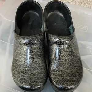 Dansko black and silver scribble pattern clogs